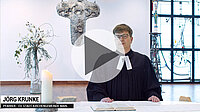 Jörg Krunke, Pfarrer, im Altarraum, Kirche, Video-Vorschau.